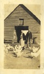 Couple outside with Chickens, Leather Photographs Album of State Normal School Student Albie Gunnells Knight by unknown