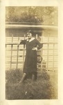 Female Standing by Lattice or Fence, Leather Photographs Album of State Normal School Student Albie Gunnells Knight by unknown
