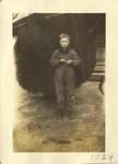 Young Boy Outside by Bush, Leather Photographs Album of State Normal School Student Albie Gunnells Knight by unknown