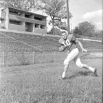 Doug Wheeler, 1964-1965 Football Player 1 by Opal R. Lovett