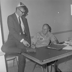 Colonel George Haskins and Student, 1967 Fall Class Registration in Leone Cole Auditorium 1 by Opal R. Lovett