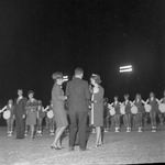 Jan Garner Congratulated by Former Queen Nancy Seiler, 1967 Homecoming Halftime by Opal R. Lovett