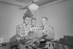 James Jeffery, Larry Hancock, and Colonel George D. Haskins Look at Brochure Map Together 1 by Opal R. Lovett