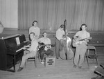 Members of Ted Kirby's Band Inside College Gymnasium 2 by unknown