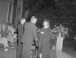President Houston Cole Presents Diploma during Outdoor Commencement held on Bibb Graves Hall Porch by Opal R. Lovett