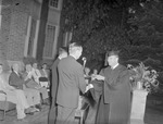 President Houston Cole Presents Diploma during Outdoor Commencement held on Bibb Graves Hall Porch 2 by Opal R. Lovett
