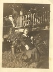 Mary Robinson Hause Seated Outside Home by unknown