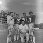 Coach Clarkie Mayfield with Football Players by Opal R. Lovett
