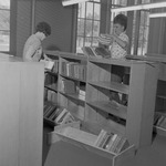 Workers inside Ramona Wood Library 5 by Opal R. Lovett