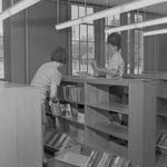 Workers inside Ramona Wood Library 6 by Opal R. Lovett