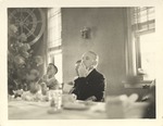 Dr. Houston Cole Smoking at Table during Rotary Clubs Annual Assembly Luncheon or Dinner by Lollar's Kodak Parlor