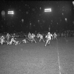 1966 Football Game Action 57 by Opal R. Lovett