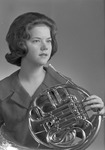 Musician Holding French Horn by Opal R. Lovett