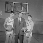 Basketball Players Paul Trammell and Fred Lovvorn with Coach Tom Roberson by Opal R. Lovett