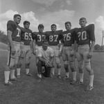 Football Coach Charley Pell with 1969-1970 Football Players Outside on Field 2 by Opal R. Lovett