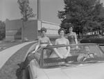 Miss Homecoming and Runners-Up Ride in Parade Car Driven by Gerald Waldrop, 1963 Homecoming Activities by Opal R. Lovett
