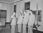 Lieutenant Colonel John Brock Administers Oath during ROTC Commissioning Ceremony by Opal R. Lovett
