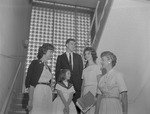 Student Vicki Hallman on Staircase in Mason Hall with Others by Opal R. Lovett