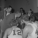 Basketball Coach Tom Roberson with Players on Sidelines 2 by Opal R. Lovett