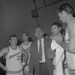 Basketball Coach Tom Roberson with Players on Sidelines 5 by Opal R. Lovett