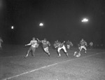 Evening Football Game Action 1 by Opal R. Lovett