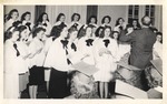 Women's Choir, directed by L.P. Jackson, Singing at June Graduation by unknown