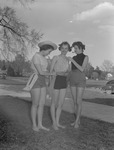 Three 1950s Female Students Dressed With A Sash Around Waist by Opal R. Lovett