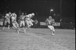 1977 Football Game Action 3 by Opal R. Lovett