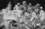 1977 Football Game Action 33 by Opal R. Lovett
