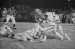 1977 Football Game Action 55 by Opal R. Lovett