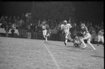 1977 Football Game Action 58 by Opal R. Lovett