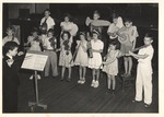 JSTC Elementary Laboratory School Children with Instrument Cut-Outs Perform as an Orchestra 1 by unknown