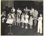 JSTC Elementary Laboratory School Children with Instrument Cut-Outs Perform as an Orchestra 3 by unknown