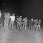 Students and Marching Southerners in the Football Stadium, 1970s Pep Rally 2 by Opal R. Lovett