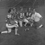 Circa 1975 Football Players with Coach Tommy Simpson 1 by Opal R. Lovett