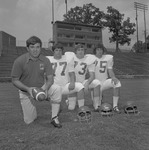 Circa 1975 Football Players with Coach Clarkie Mayfield 2 by Opal R. Lovett