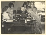 JSTC Elementary Laboratory School Students gathered around Aquarium in Classroom by unknown