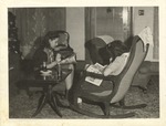 Two Girls Reading Magazines in Home by unknown
