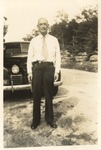 Unidentified Male with Car 2 by unknown