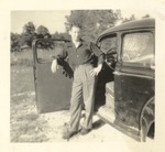 Unidentified Male with Car 3 by unknown
