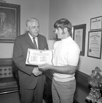 Dr. Ernest Stone Congratulates Jimmy Champion, 1970 Little All American 3 by Opal R. Lovett