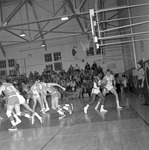 1972-1973 Men's Basketball Game Action 2 by Opal R. Lovett