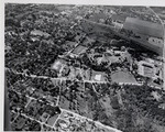 Aerial view of the city of Jacksonville, Jacksonville State University campus, and Jacksonville High School by Anniston-Calhoun County Public Library