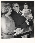President Houston Cole Greets Vietnam Family, 1966 Christmas Party in Anders Hall Roundhouse by Opal R. Lovett