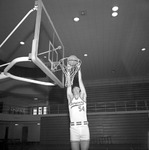 Ron Money, 1974-1975 Men's Basketball Player Scores a Layup 2 by Opal R. Lovett