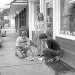 Students on Sidewalk Outside of Jacksonville Square Storefront 1 by Opal R. Lovett