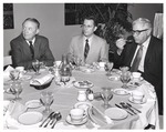 President Houston Cole, Hugh Merrill, and President Ernest Stone at Table by Opal R. Lovett