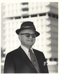 President Emeritus Houston Cole in front of Houston Cole Library by Opal R. Lovett