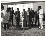 President Houston Cole Among Men holding shovels at tree planting ceremony by U.S. Army Photo Corps