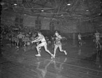 1955-1956 Basketball Game Action 1 by Opal R. Lovett
